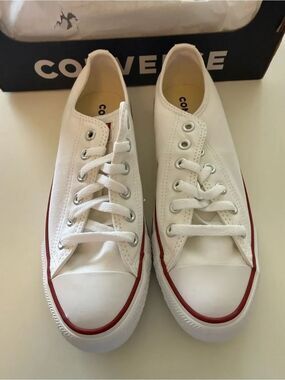 Converse White Low Top Sneakers with Red Trim